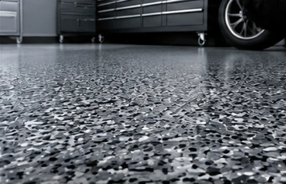 Close-up of a grey and black flake floor